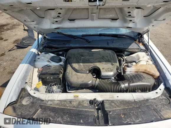 ✅ 2014 Dodge Challenger SXT • VIN: 2C3CDYAG0EH149589 • Lot: 80923345. Wystawiony na Copart z przebiegiem 97 282 mil. Bezpłatny archiwum sprzedaży aukcyjnych z USA i szczegółowy raport historii pojazdu na DreamBid. Zdjęcie 11.