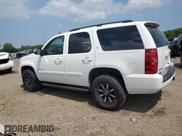 2007 Chevrolet Tahoe LTZ с VIN 1GNFK13097J255473, выставлен на аукционе Copart как лот 68166135 с пробегом 168 573 миль миль и Списание • Salvage title. История ставок и продаж доступна на DreamBid. Изображение 2.