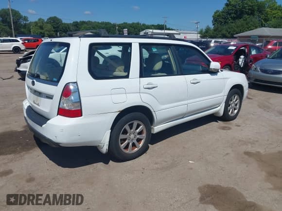 ✅ 2007 Subaru Forester X • VIN: JF1SG656X7H733369 • Lot: 42625071. Listed on IAAI with 148,877 mi. Free auction sales archive from the USA and detailed vehicle history report at DreamBid. Image 4.