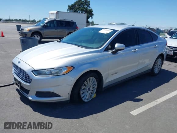 ✅ 2016 Ford Fusion S Hybrid • VIN: 3FA6P0UU5GR342983 • Лот: 42302440. Опубликован ранее на IAAI с пробегом 141 830 миль. Бесплатный доступ к архиву аукционных продаж из США и подробный отчёт об истории автомобиля на DreamBid. Изображение 17.