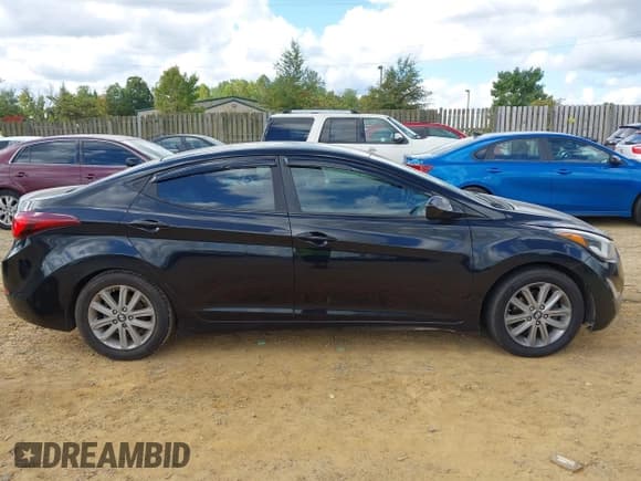 ✅ 2015 Hyundai Elantra SE • VIN: KMHDH4AE3FU261258 • Lot: 43357211. Listed on IAAI with 201,597 mi. Free auction sales archive from the USA and detailed vehicle history report at DreamBid. Image 13.