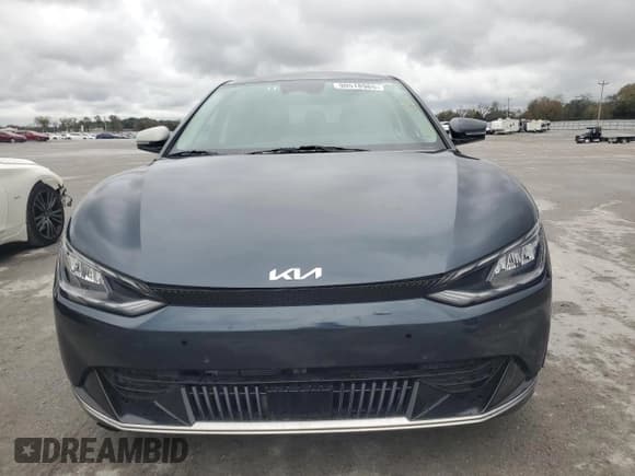 ✅ 2024 Kia EV6 Wind • VIN: KNDC3DLC5R5198575 • Lot: 90518965. Wystawiony na Copart z przebiegiem 9 450 mil. Bezpłatny archiwum sprzedaży aukcyjnych z USA i szczegółowy raport historii pojazdu na DreamBid. Zdjęcie 5.