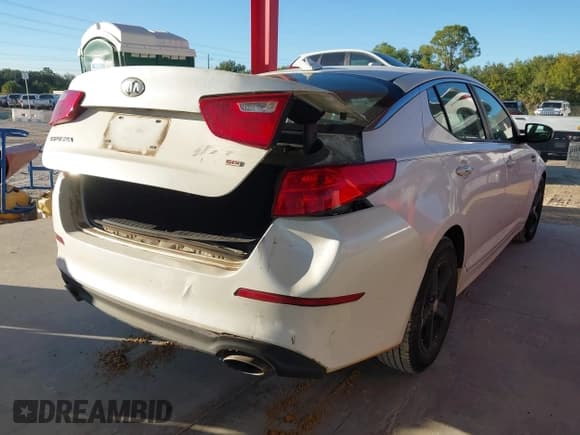 ✅ 2014 Kia Optima LX • VIN: KNAGM4A71E5522942 • Lot: 43708941. Listed on IAAI with 165,799 mi. Free auction sales archive from the USA and detailed vehicle history report at DreamBid. Image 6.