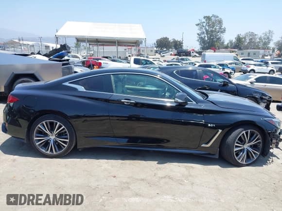 ✅ 2017 Infiniti Q60 Premium • VIN: JN1EV7EK2HM360839 • Lot: 42348591. Wystawiony na IAAI z przebiegiem 72 129 mil. Bezpłatny archiwum sprzedaży aukcyjnych z USA i szczegółowy raport historii pojazdu na DreamBid. Zdjęcie 14.