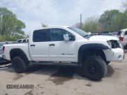 ✅ 2005 Nissan Titan LE • VIN: 1N6AA07BX5N525048 • Lot: 41984150. Listed on IAAI with 242,321 mi. Free auction sales archive from the USA and detailed vehicle history report at DreamBid. Image 14.