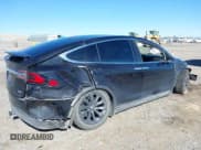 ✅ 2018 Tesla Model X 75D • VIN: 5YJXCBE21JF115561 • Lot: 39145954. Listed on IAAI with Not provided. Free auction sales archive from the USA and detailed vehicle history report at DreamBid. Image 4.