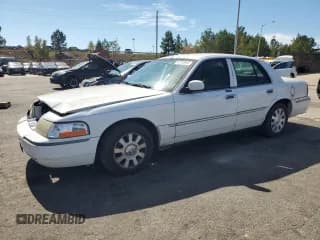 ✅ 2003 Mercury Grand Marquis LS Premium • VIN: 2MEFM75W43X670417 • Лот: 87365615. Опубликован ранее на Copart с пробегом 210 680 миль. Бесплатный доступ к архиву аукционных продаж из США и подробный отчёт об истории автомобиля на DreamBid. Изображение 1.