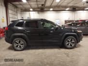 ✅ 2015 Jeep Cherokee Trailhawk • VIN: 1C4PJMBS7FW650340 • Lot: 43755791. Listed on IAAI with 129,855 mi. Free auction sales archive from the USA and detailed vehicle history report at DreamBid. Image 13.