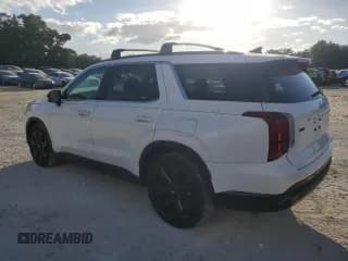 ✅ 2023 Hyundai Palisade XRT • VIN: KM8R34GE6PU512206 • Лот: 76496554. Опубликован ранее на Copart с пробегом 12 339 миль. Бесплатный доступ к архиву аукционных продаж из США и подробный отчёт об истории автомобиля на DreamBid. Изображение 2.