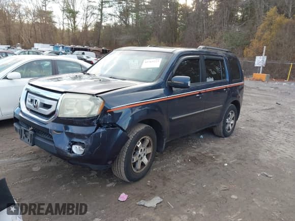 ✅ 2011 Honda Pilot Touring • VIN: 5FNYF4H91BB058733 • Lot: 43765223. Listed on IAAI with 219,502 mi. Free auction sales archive from the USA and detailed vehicle history report at DreamBid. Image 18.