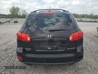 2009 Hyundai Santa Fe Limited with VIN 5NMSH13E69H304395, listed as a Copart auction lot 70064874 with 133,028 mi miles and Clean title. Bid and sale history available at DreamBid. Image 6.