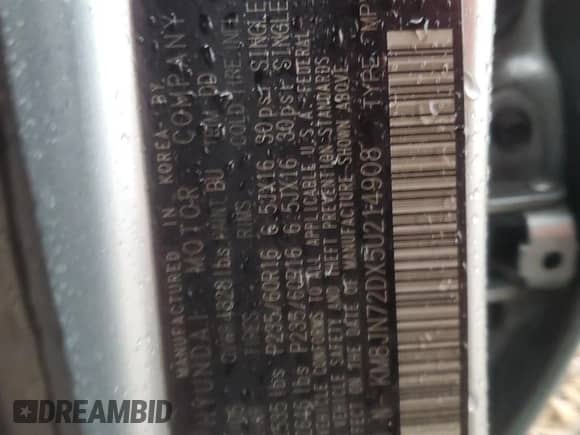 2005 Hyundai Tucson GLS z VIN KM8JN72DX5U214908, wystawiony jako Copart lot #76346024 z przebiegiem 152 677 mil mil oraz Szkoda całkowita • Salvage title. Historia ofert i sprzedaży dostępna na DreamBid. Obrazek 12.