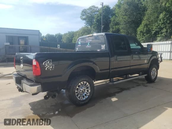 ✅ 2011 Ford F-250 Lariat • VIN: 1FT7W2BT1BEC18633 • Lot: 62847145. Listed on Copart with 266,124 mi. Free auction sales archive from the USA and detailed vehicle history report at DreamBid. Image 3.