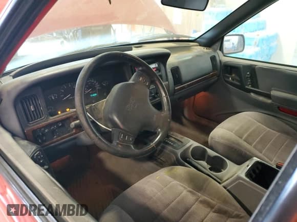 ✅ 1997 Jeep Grand Cherokee Laredo • VIN: 1J4GZ58S1VC644758 • Lot: 68364335. Listed on Copart with 171,634 mi. Free auction sales archive from the USA and detailed vehicle history report at DreamBid. Image 8.