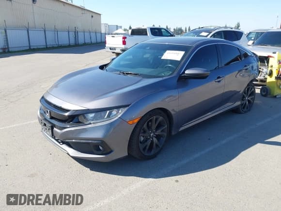 ✅ 2021 Honda Civic Sport • VIN: 19XFC2F88ME201796 • Lot: 43594107. Wystawiony na IAAI z przebiegiem 86 330 mil. Bezpłatny archiwum sprzedaży aukcyjnych z USA i szczegółowy raport historii pojazdu na DreamBid. Zdjęcie 2.