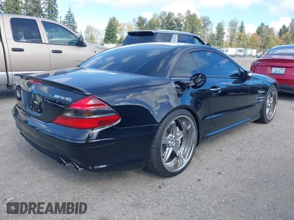 ✅ 2005 Mercedes-Benz SL 55 AMG • VIN: WDBSK74F65F099663 • Lot: 43377046. Listed on IAAI with 31,050 mi. Free auction sales archive from the USA and detailed vehicle history report at DreamBid. Image 4.
