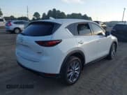 ✅ 2019 Mazda CX-5 Grand Touring • VIN: JM3KFBDM2K1591372 • Lot: 43458033. Wystawiony na IAAI z przebiegiem 68 908 mil. Bezpłatny archiwum sprzedaży aukcyjnych z USA i szczegółowy raport historii pojazdu na DreamBid. Zdjęcie 4.