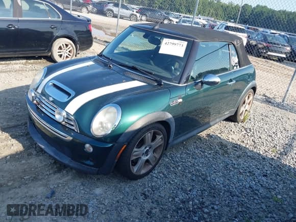 ✅ 2007 MINI Convertible S • VIN: WMWRH33557TJ44349 • Lot: 42799773. Listed on IAAI with 92,482 mi. Free auction sales archive from the USA and detailed vehicle history report at DreamBid. Image 2.