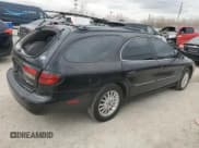 ✅ 2003 Mercury Sable LS Premium • VIN: 1MEHM59S83A615711 • Lot: 49820525. Listed on Copart with 108,594 mi. Free auction sales archive from the USA and detailed vehicle history report at DreamBid. Image 3.