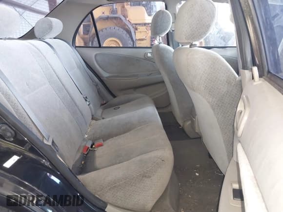 ✅ 1999 Toyota Corolla VE • VIN: 1NXBR12E0XZ197084 • Lot: 43220717. Listed on IAAI with 169,897 mi. Free auction sales archive from the USA and detailed vehicle history report at DreamBid. Image 8.