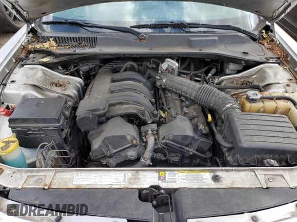 2009 Dodge Charger SE с VIN 2B3KA43D19H517815, выставлен на аукционе Copart как лот 75707794 с пробегом 150 632 миль миль и Списание • Salvage title. История ставок и продаж доступна на DreamBid. Изображение 11.