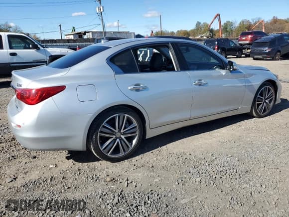 ✅ 2014 Infiniti Q50 Premium • VIN: JN1BV7AR7EM699341 • Лот: 90222175. Опубликован ранее на Copart с пробегом 130 886 миль. Бесплатный доступ к архиву аукционных продаж из США и подробный отчёт об истории автомобиля на DreamBid. Изображение 3.