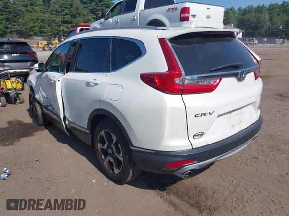 ✅ 2018 Honda CR-V Touring • VIN: 5J6RW2H97JL011348 • Lot: 42973030. Listed on IAAI with Not provided. Free auction sales archive from the USA and detailed vehicle history report at DreamBid. Image 3.