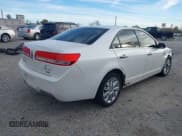 ✅ 2012 Lincoln MKZ • VIN: 3LNHL2JC5CR813039 • Lot: 43538743. Listed on IAAI with 106,370 mi. Free auction sales archive from the USA and detailed vehicle history report at DreamBid. Image 4.
