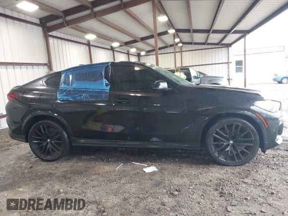 ✅ 2021 BMW X6 xDrive40i • VIN: 5UXCY6C01M9F60021 • Lot: 41972595. Wystawiony na IAAI z przebiegiem 64 064 mil. Bezpłatny archiwum sprzedaży aukcyjnych z USA i szczegółowy raport historii pojazdu na DreamBid. Zdjęcie 13.