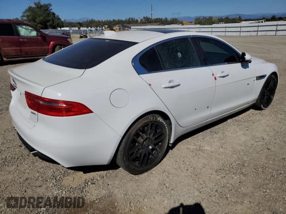 ✅ 2019 Jaguar XE 25t • VIN: SAJAR4FX1KCP52699 • Lot: 81142465. Listed on Copart with 100,883 mi. Free auction sales archive from the USA and detailed vehicle history report at DreamBid. Image 3.
