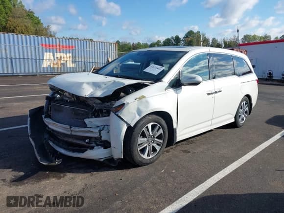 ✅ 2014 Honda Odyssey Touring • VIN: 5FNRL5H93EB043383 • Lot: 43571864. Listed on IAAI with 186,950 mi. Free auction sales archive from the USA and detailed vehicle history report at DreamBid. Image 2.