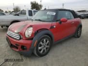✅ 2010 MINI Convertible • VIN: WMWMR3C56ATU97164 • Lot: 83908904. Wystawiony na Copart z przebiegiem 153 936 mil. Bezpłatny archiwum sprzedaży aukcyjnych z USA i szczegółowy raport historii pojazdu na DreamBid. Zdjęcie 1.
