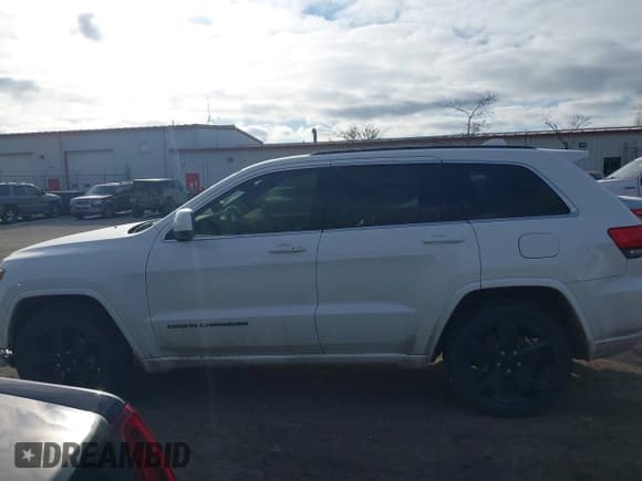 ✅ 2015 Jeep Grand Cherokee Laredo • VIN: 1C4RJEAG8FC721512 • Lot: 41090495. Listed on IAAI with 91,761 mi. Free auction sales archive from the USA and detailed vehicle history report at DreamBid. Image 14.