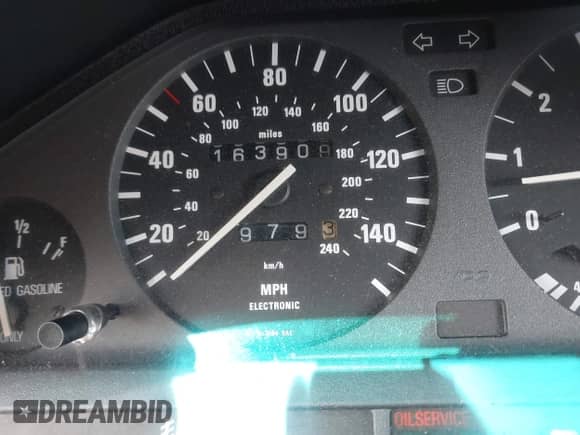 1991 BMW 3 Series z VIN WBABB2315MEC25347, wystawiony jako IAAI lot #42422155 z przebiegiem 163 909 mil mil oraz . Historia ofert i sprzedaży dostępna na DreamBid. Obrazek 14.