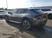 ✅ 2024 Kia EV6 Wind • VIN: KNDC3DLC3R5163033 • Lot: 57773865. Wystawiony na Copart z przebiegiem 9 996 mil. Bezpłatny archiwum sprzedaży aukcyjnych z USA i szczegółowy raport historii pojazdu na DreamBid. Zdjęcie 2.