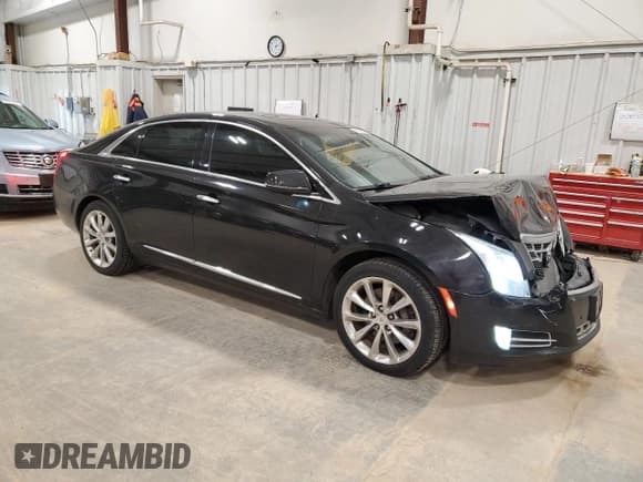 ✅ 2014 Cadillac XTS Premium • VIN: 2G61R5S37E9224347 • Лот: 51995405. Опубликован ранее на Copart с пробегом 103 385 миль. Бесплатный доступ к архиву аукционных продаж из США и подробный отчёт об истории автомобиля на DreamBid. Изображение 4.