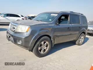 2011 Honda Pilot LX with VIN 5FNYF3H22BB025642, listed as a Copart auction lot 86422505 with 218,286 mi miles and Salvage title. Bid and sale history available at DreamBid. Image 1.