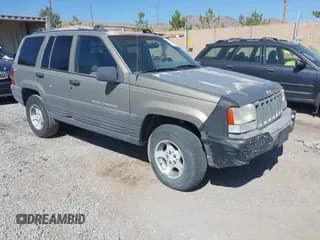 ✅ 1997 Jeep Grand Cherokee Laredo • VIN: 1J4GZ58S3VC603239 • Lot: 42593915. Listed on IAAI with 295,696 mi. Free auction sales archive from the USA and detailed vehicle history report at DreamBid. Image 1.