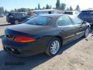 ✅ 2004 Chrysler Concorde Limited • VIN: 2C3HD56G34H695881 • Lot: 42853067. Listed on IAAI with 123,759 mi. Free auction sales archive from the USA and detailed vehicle history report at DreamBid. Image 4.
