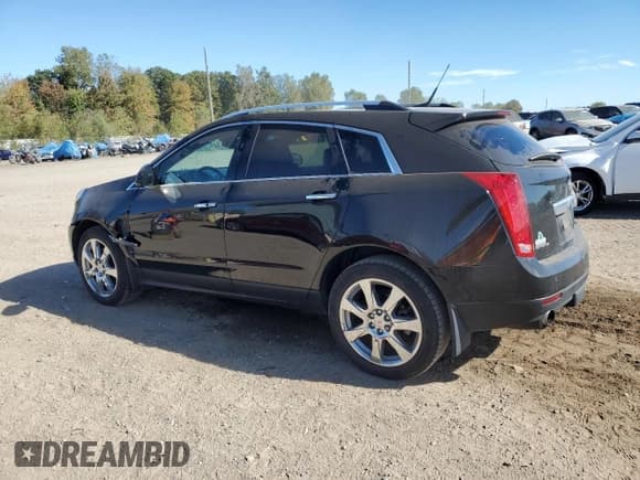 ✅ 2012 Cadillac SRX Performance Collection • VIN: 3GYFNEE36CS530962 • Лот: 82447995. Опубликован ранее на Copart с пробегом 80 152 миль. Бесплатный доступ к архиву аукционных продаж из США и подробный отчёт об истории автомобиля на DreamBid. Изображение 2.