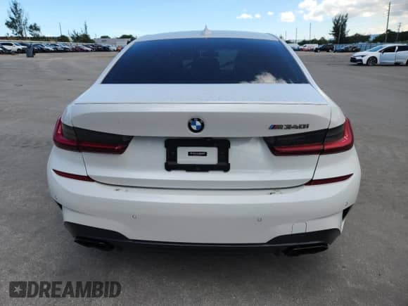 2022 BMW 3 Series M340i with VIN 3MW5U7J05N8C29964, listed as a Copart auction lot 67061755 with 30,874 mi miles and Salvage title. Bid and sale history available at DreamBid. Image 6.