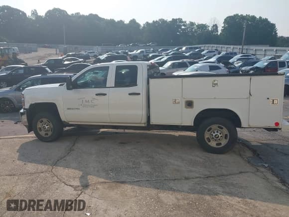 ✅ 2015 Chevrolet Silverado 2500HD Work Truck • VIN: 1GB2CUEG4FZ143703 • Lot: 42329240. Listed on IAAI with 245,752 mi. Free auction sales archive from the USA and detailed vehicle history report at DreamBid. Image 14.