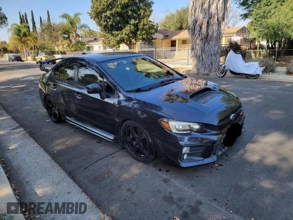 ✅ 2015 Subaru WRX STI • VIN: JF1VA2L67F9800433 • Lot: 42261165. Listed on Copart with 112,397 mi. Free auction sales archive from the USA and detailed vehicle history report at DreamBid. Image 1.