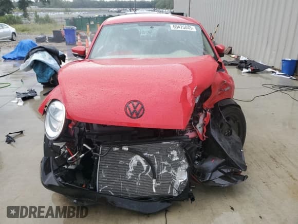 ✅ 2013 Volkswagen Beetle 2.5L • VIN: 3VWJX7AT0DM607856 • Lot: 65475045. Listed on Copart with 63,103 mi. Free auction sales archive from the USA and detailed vehicle history report at DreamBid. Image 5.