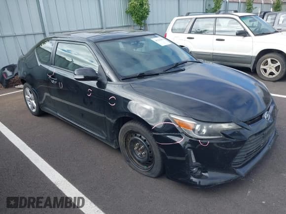 ✅ 2015 Scion tC • VIN: JTKJF5C75F3091288 • Lot: 40225650. Listed on IAAI with 126,119 mi. Free auction sales archive from the USA and detailed vehicle history report at DreamBid. Image 1.