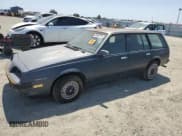 ✅ 1985 Pontiac Sunbird • VIN: 1G2JB350XF7575719 • Lot: 60540725. Listed on Copart with 60,511 mi. Free auction sales archive from the USA and detailed vehicle history report at DreamBid. Image 1.