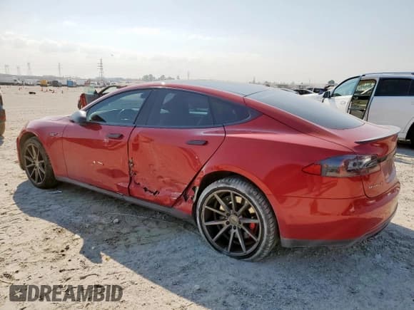 ✅ 2014 Tesla Model S P85D • VIN: 5YJSA1H26EFP62663 • Lot: 84757545. Listed on Copart with 95,844 mi. Free auction sales archive from the USA and detailed vehicle history report at DreamBid. Image 2.