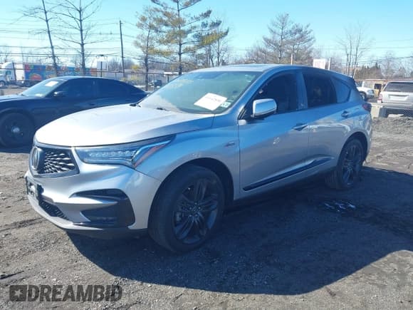 ✅ 2021 Acura RDX w/A-Spec Package • VIN: 5J8TC2H66ML034961 • Lot: 41642890. Listed on IAAI with 83,707 mi. Free auction sales archive from the USA and detailed vehicle history report at DreamBid. Image 2.