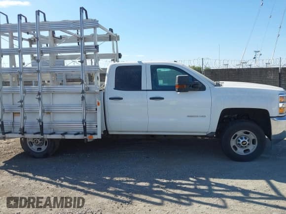 ✅ 2019 Chevrolet Silverado 2500HD Work Truck • VIN: 2GC2CREG1K1124277 • Лот: 43163771. Опубликован ранее на IAAI с пробегом 244 988 миль. Бесплатный доступ к архиву аукционных продаж из США и подробный отчёт об истории автомобиля на DreamBid. Изображение 13.