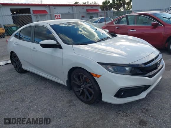✅ 2020 Honda Civic Sport • VIN: 19XFC2F85LE005197 • Lot: 43582449. Wystawiony na IAAI z przebiegiem 41 657 mil. Bezpłatny archiwum sprzedaży aukcyjnych z USA i szczegółowy raport historii pojazdu na DreamBid. Zdjęcie 1.